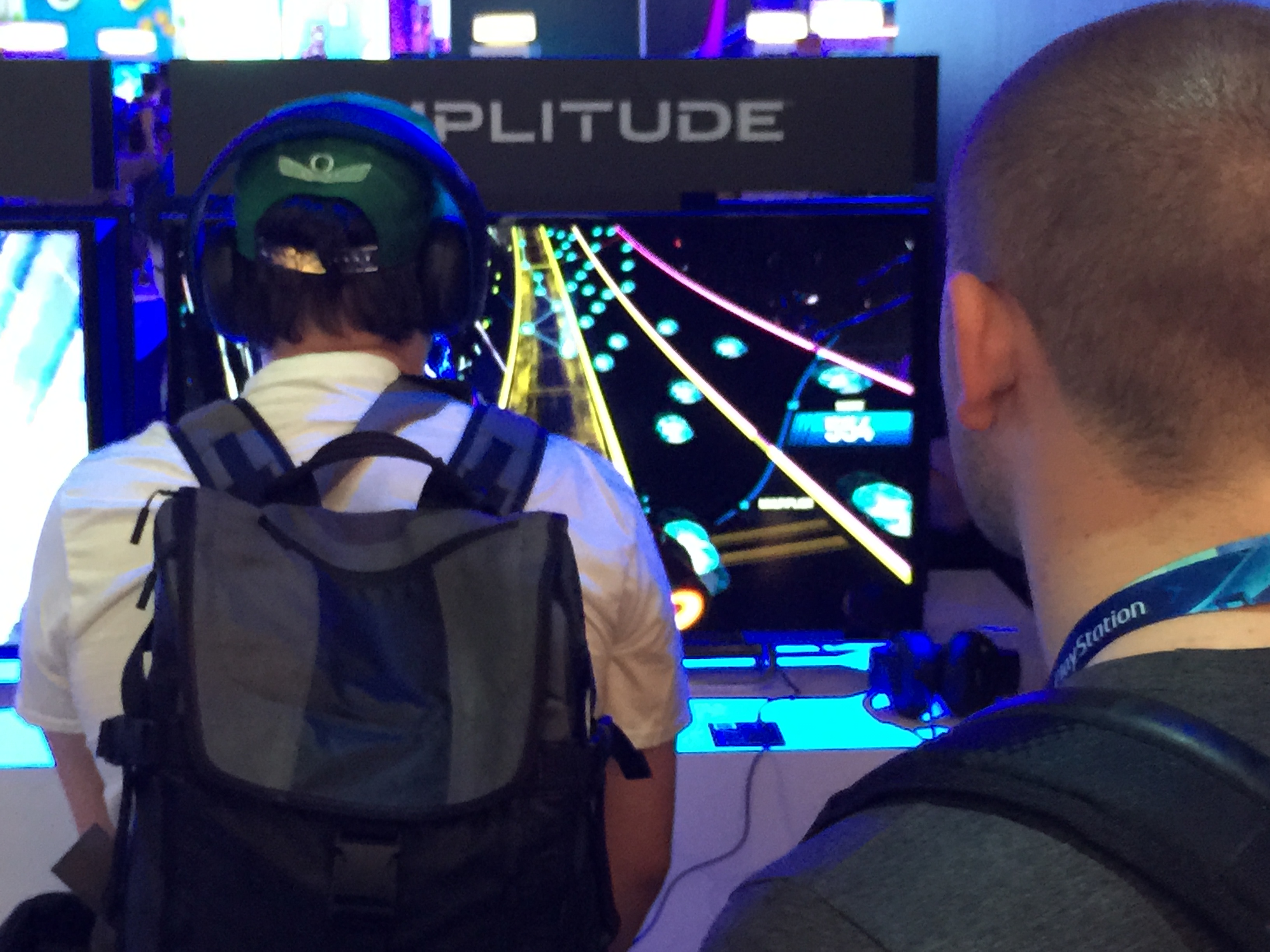 Fans playing Amplitude at E3